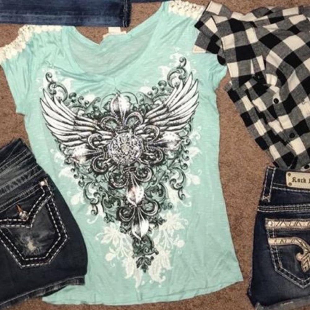 Blue angel and diamond shirt from the buckle